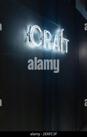 Wroclaw, Poland - March 7 2020 Craft restaurant neon logo in The Bridge Hotel Stock Photo