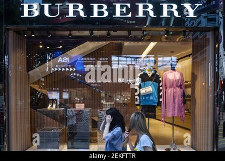 Pedestrians walk past the British luxury fashion brand Burberry store seen in Hong Kong. Photo by Budrul Chukrut SOPA Images Sipa USA Stock Photo Alamy