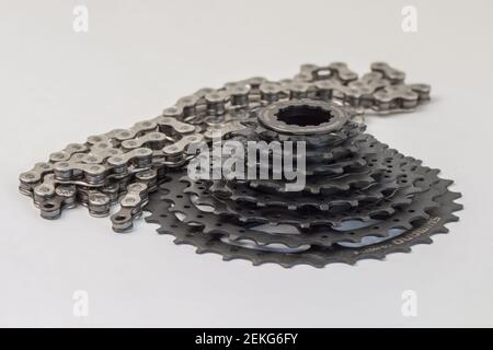 Krasnodar, Russia - February 12, 2021: A new black Shimano bicycle cassette and a new M-Wave chain Stock Photo
