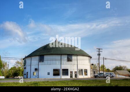 A Round Barn view in Indiana, United States. Round barn is a historic barn design that could be octagonal, polygonal, or circular Stock Photo