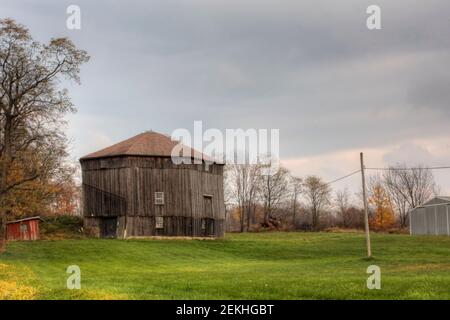 A Round Barn in Ohio, United States. Round barn is a historic barn design that could be octagonal, polygonal, or circular Stock Photo