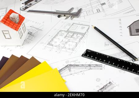 Close-up of Architect engineer drawing plan with architect equipment. Paper architectural drawings and blueprint. Interior Design Stock Photo