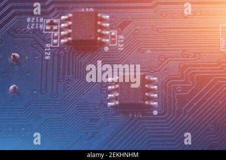Blue circuit board background. Electronic board toned blue. Stock Photo