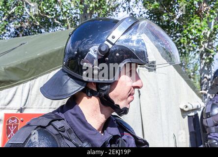 Samara, Russia - October 9, 2017: Special Forces soldier in protective helmet with glasses and police uniform Stock Photo