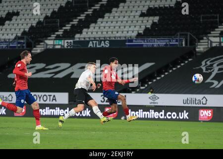 Derby, UK. 23rd Feb, 2021. Martyn Waghorn #9 of Derby County scores to make it 2-0 in Derby, UK on 2/23/2021. (Photo by Mark Cosgrove/News Images/Sipa USA) Credit: Sipa USA/Alamy Live News Stock Photo