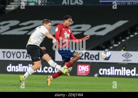 Derby, UK. 23rd Feb, 2021. Martyn Waghorn #9 of Derby County scores to make it 2-0 in Derby, UK on 2/23/2021. (Photo by Mark Cosgrove/News Images/Sipa USA) Credit: Sipa USA/Alamy Live News Stock Photo