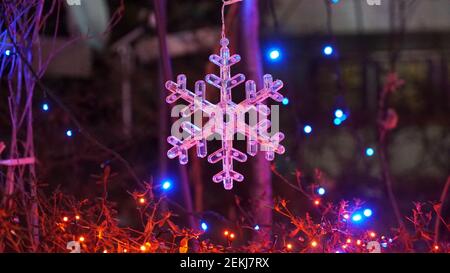Hanging Snow crystal shape decorations to celebrate Christmas Stock Photo