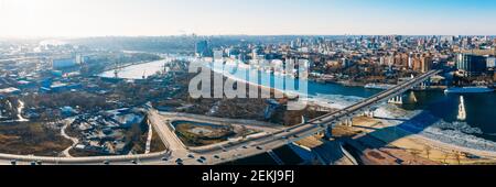 Voroshilovskiy Bridge above Don river and Rostov On Don aerial panoramic view of beautiful winter Russian city. Stock Photo
