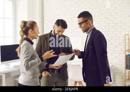 Brainstorming, negotiations, multiethnic business group team concept Stock Photo