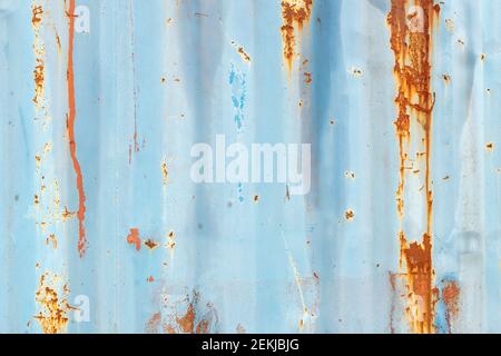 Sheet of painted rusting metal. Stock Photo