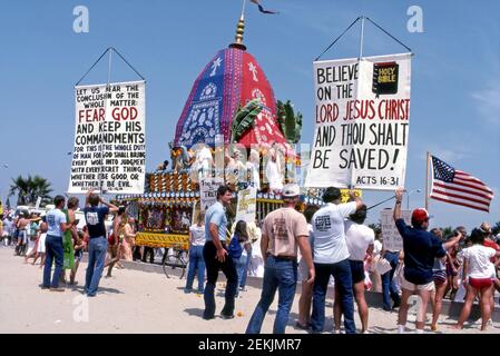 Religious Christian protesters at a Hare Krishna Festival of Chariots on the Venice Beach boardwalk. Stock Photo