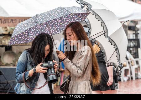 Photographer in the rain, Toronto, Canada Stock Photo
