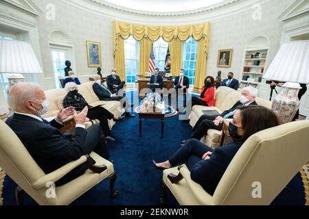 President Joe Biden and Vice President Kamala Harris meet with Secretary of the Treasury Dr. Janet Yellen and business leaders Tuesday, Feb. 9, 2021, in the Oval Office of the White House. (Official White House Photo by Adam Schultz) Stock Photo