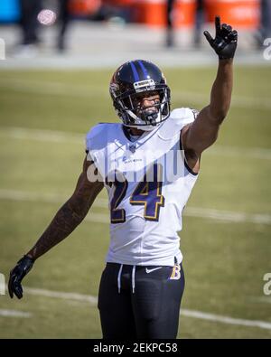 Baltimore Ravens cornerback Marcus Peters (24) looks on during pre-game  warm-ups before an NFL football game against the Carolina Panthers, Sunday,  Nov. 20, 2022, in Baltimore. (AP Photo/Terrance Williams Stock Photo 