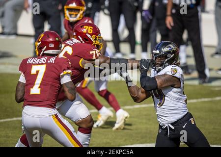 Baltimore Ravens tackle Morgan Moses (78) runs off the field