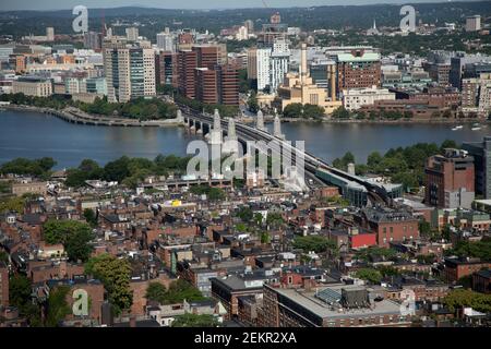 An aerial wide angle view of Beacon Hill, the Longfellow bridge over the Charles river and Cambridge MA USA.