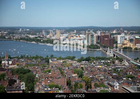 An aerial wide angle view of Beacon Hill, the Longfellow bridge over the Charles river and Cambridge MA USA.