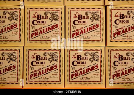Processed foods packaged, row of creamy pralines boxes displayed for sale at Aunt Sally's Prailine Shops, New Orleans, Louisiana, USA Stock Photo