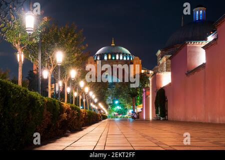 The ancient Hagia Sophia, once a cathedral and an Ottoman mosque and now a museum, illuminated at night in Sultanahmet Square in Istanbul Turkey. Stock Photo