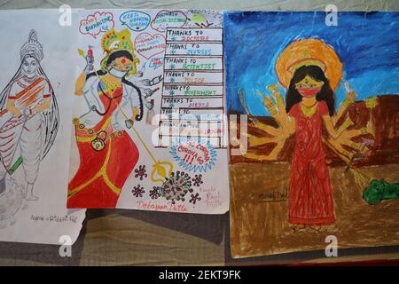 Art drawings of Goddess Durga dressed as a doctor and wearing facemask as  she spears coronavirus,