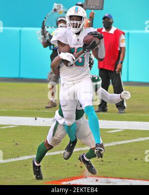 New York Jets cornerback Lamar Jackson (38) wears a shirt with a Crucial  Catch patch as he warms up on the field before taking on the Miami Dolphins  during an NFL football