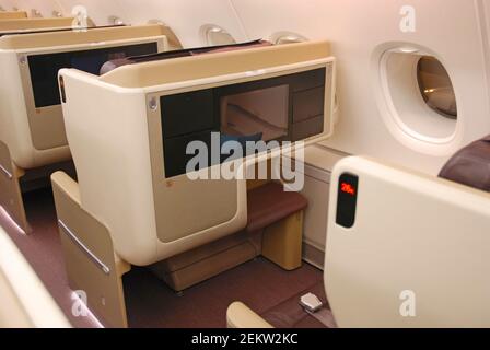 Singapore Airlines business class cabin Stock Photo - Alamy
