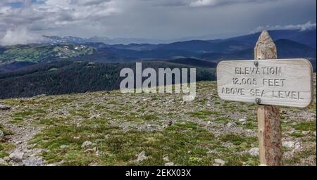 12,005 feet above sea level elevation sign Rocky Mountain National Park, Colorado, USA Stock Photo