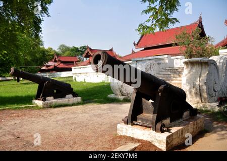 Ancient Cannon or ruins artillery at front of Mandalay Palace the last Burmese monarchy Royal Residency for Majesty for Burmese people and foreign tra Stock Photo