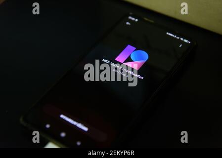 Rachaburi,Thailand - 21 February, 2021: Closeup focus to Smartphone model Mi9T updating MIUI android version 12 and Logo in reboot step Stock Photo
