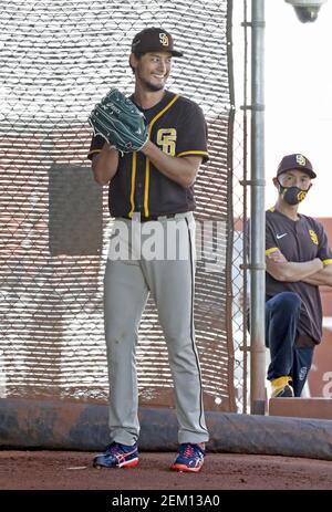 Yu Darvish of the San Diego Padres throws a bullpen session during spring  training in Peoria, Arizona, on Feb. 23, 2021, as the club's adviser for  baseball operations Hideo Nomo (R) looks