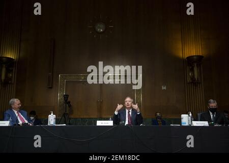 Dr. Eric E. Schmidt, Co-Founder, Schmidt Futures, left, Brad L. Smith, President, Microsoft Corporation, center, and General Herbert J. Carlisle, USAF (Ret.) / President And Chief Executive Officer, National Defense Industrial Association, right, appear before a Senate Committee on Armed Services hearing to examine emerging technologies and their impact on national security, in the Dirksen Senate Office Building in Washington, DC, USA, Tuesday, February 23, 2021. Photo by Rod Lamkey/CNP/ABACAPRESS.COM Stock Photo