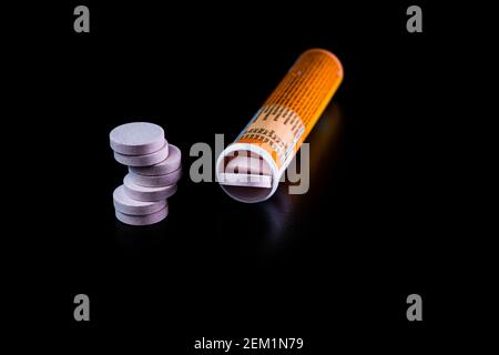 Selective focus on multivitamins effervescent tablets isolated on black. Bucharest, Romania, 2021 Stock Photo