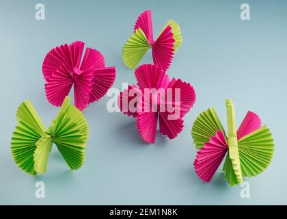Zig zag fold paper ornaments. DIY paper crafts. Stock Photo