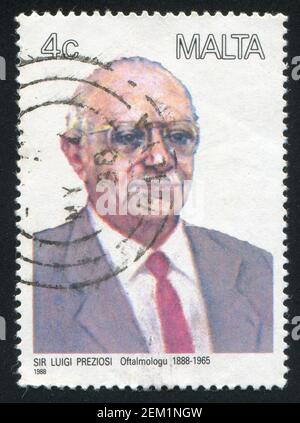 MALTA - CIRCA 1988: stamp printed by Malta, shows Ophthalmologist Luigi Preziosi, circa 1988 Stock Photo