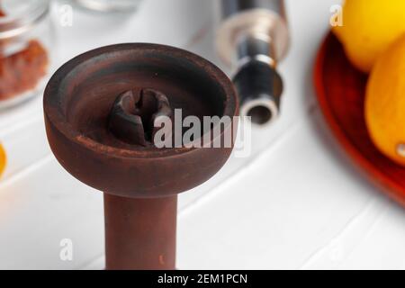 Empty hookah shaft close up on table with fresh fruit Stock Photo