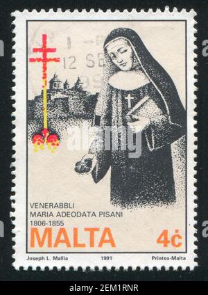 MALTA - CIRCA 1991: stamp printed by Malta, shows Marie Therese Pisani, Benedictine Nun, circa 1991 Stock Photo