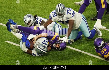 Dallas Cowboys safety Donovan Wilson (37) and linebacker Joe