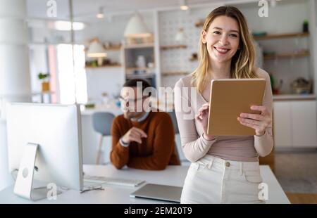 Young creative managers team working with new startup project in office Stock Photo
