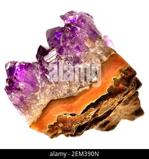 Amethyst crystals (purple quartz) on a matrix of rock strata Stock Photo