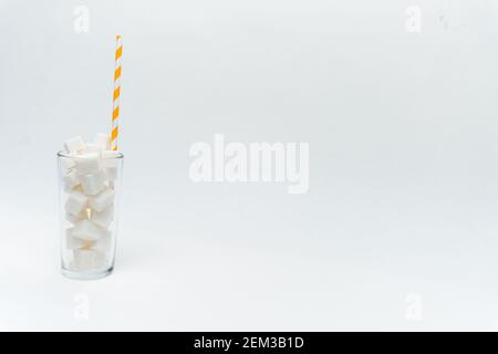 sugar in a glass with a straw cocktail sweets energy Stock Photo