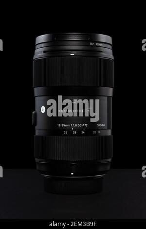 Heraklion, Greece - January 08, 2020: Sigma lens 18-35mm F/1.8 DC HSM Art for Nikon, standing upright on a black background. Stock Photo