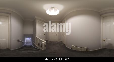 360 degree panoramic view of A 360 Degree Full Sphere Panoramic photo of a modern newly built house interior showing the stairs and hallway of the British newly built house