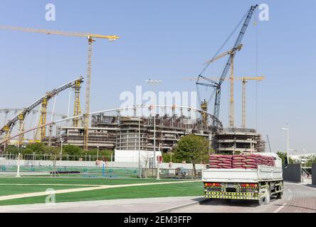 QATAR, Doha, construction site Khalifa International Stadium for FIFA world cup 2022, built by contractor midmac and sixt contract / KATAR, Doha, Baustelle Khalifa International Stadium fuer die  FIFA Fussballweltmeisterschaft 2022, LKW mit Zement Stock Photo