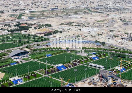 QATAR, Doha, construction site Sportpark Aspire Academy for Sports Excellence for FIFA world cup 2022 , irrigated green lawn in the desert, also training camp of german soccer team FC Bayern, FC Bavaria Stock Photo