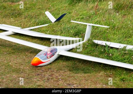 Flying model plane with dummy pilot used for aeromodelling Stock Photo