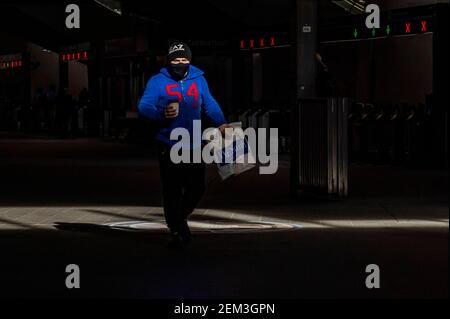 London, UK. 23rd Feb, 2021. London Bridge Station is fairly quiet during the current national Lockdown. Most travellers wear masks as they are mandatory. Credit: Guy Bell/Alamy Live News Stock Photo