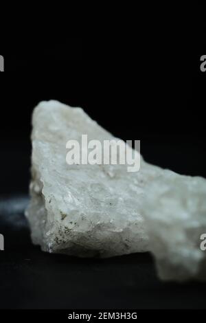 Crystalized salt rocks on dark background. Close up Stock Photo