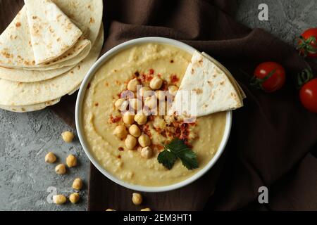 Concept of tasty eat with hummus and pita, top view Stock Photo