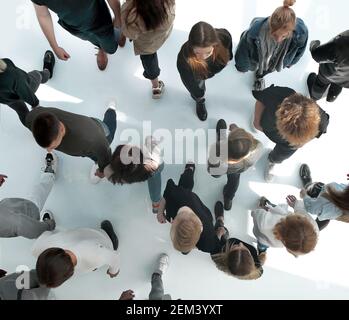 top view .groups of diverse young people moving towards each other Stock Photo