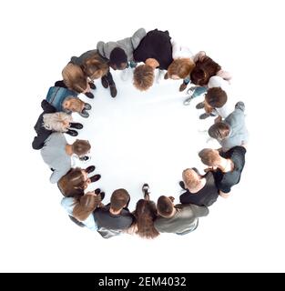 top view . casual group of young people standing in a circle . Stock Photo